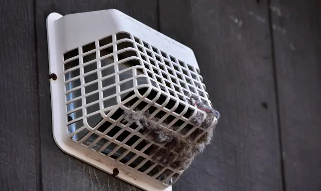 Clogged dryer vent that needs cleaned